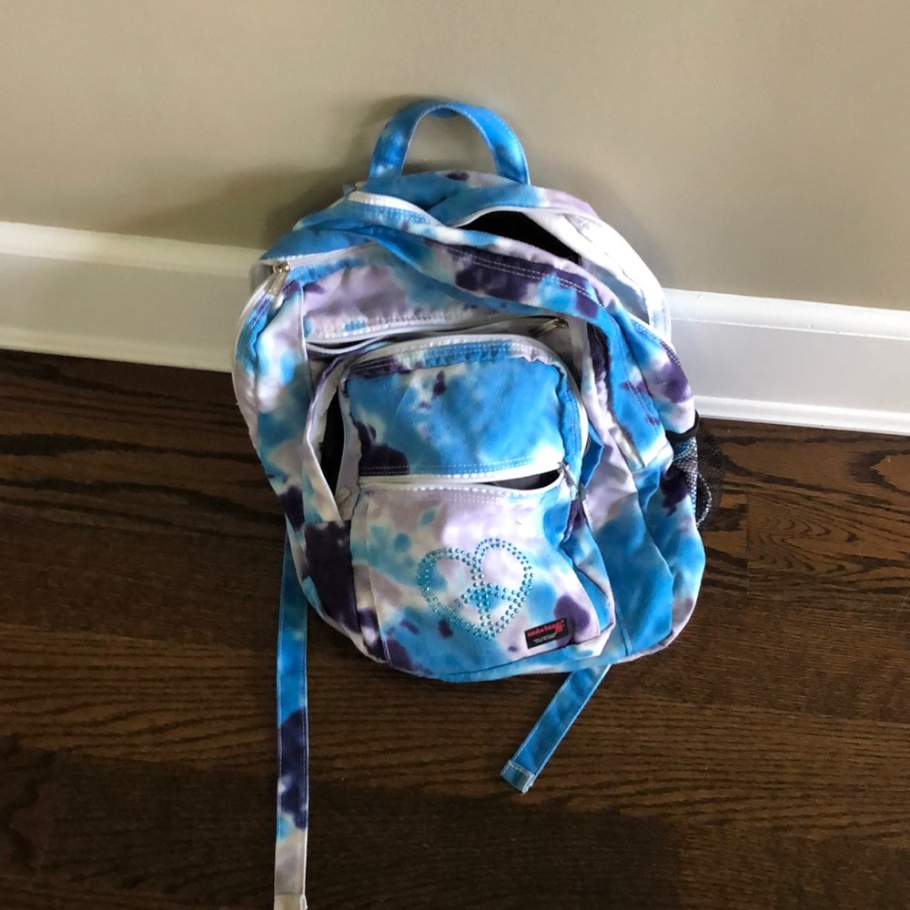Tie-dye backpack with peace heart bling.